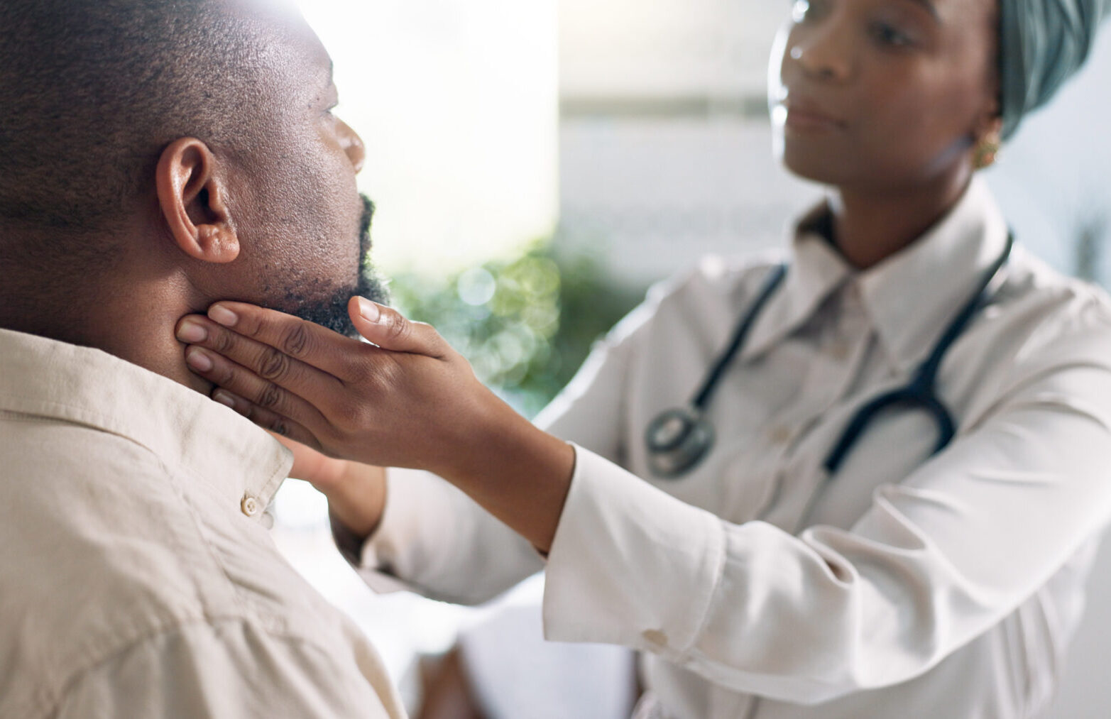 hands-doctor-and-check-throat-of-patient-for-thyr-2026-01-09-11-31-27-utc-aspect-ratio-1712-1108