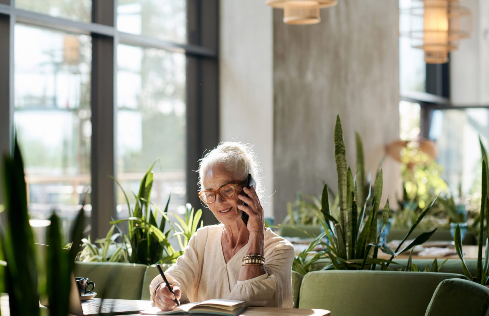 senior-woman-having-conversation-on-mobile-phone-2026-01-08-01-03-27-utc-aspect-ratio-1712-1108